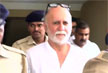 Tehelka founder Tarun Tejpal surrenders in Goa rape case, sent to jail